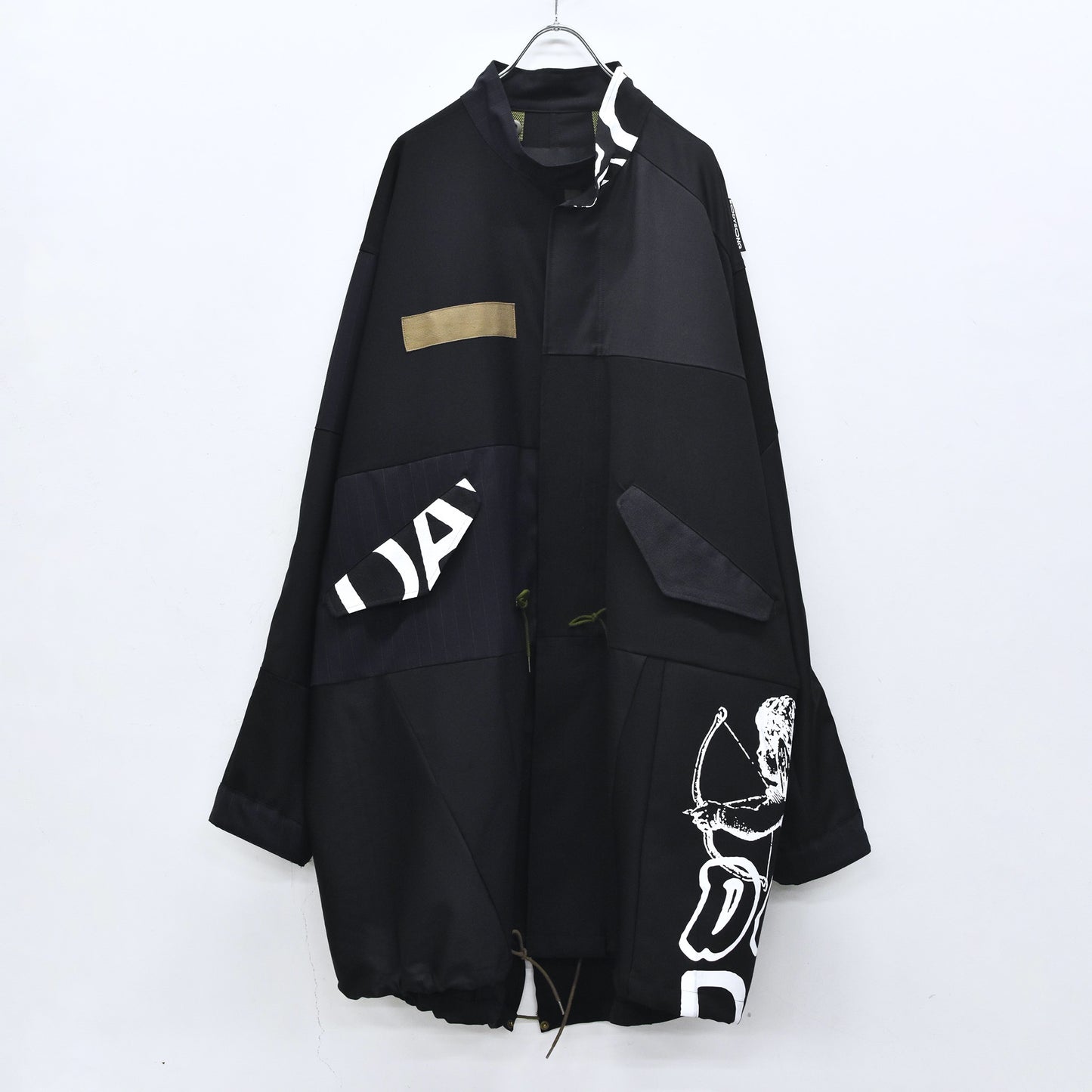 BODYSONG. / PATCHWORK MIL COAT MADE BY DISASSEMBLING AND RECONSTRUCTING A BUSINESS SUIT
