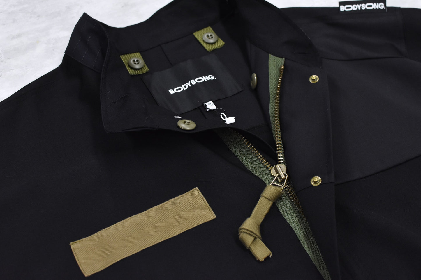 BODYSONG. / PATCHWORK MIL COAT MADE BY DISASSEMBLING AND RECONSTRUCTING A BUSINESS SUIT