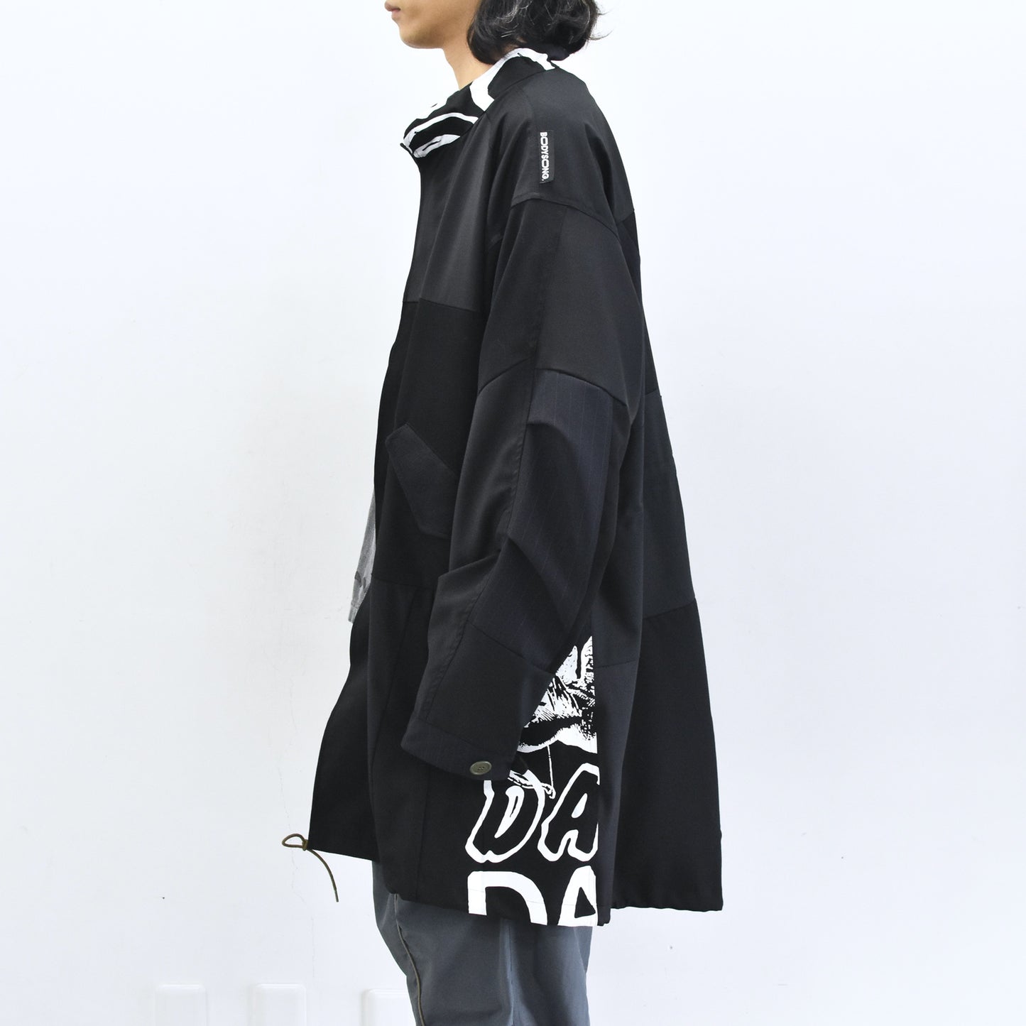 BODYSONG. / PATCHWORK MIL COAT MADE BY DISASSEMBLING AND RECONSTRUCTING A BUSINESS SUIT