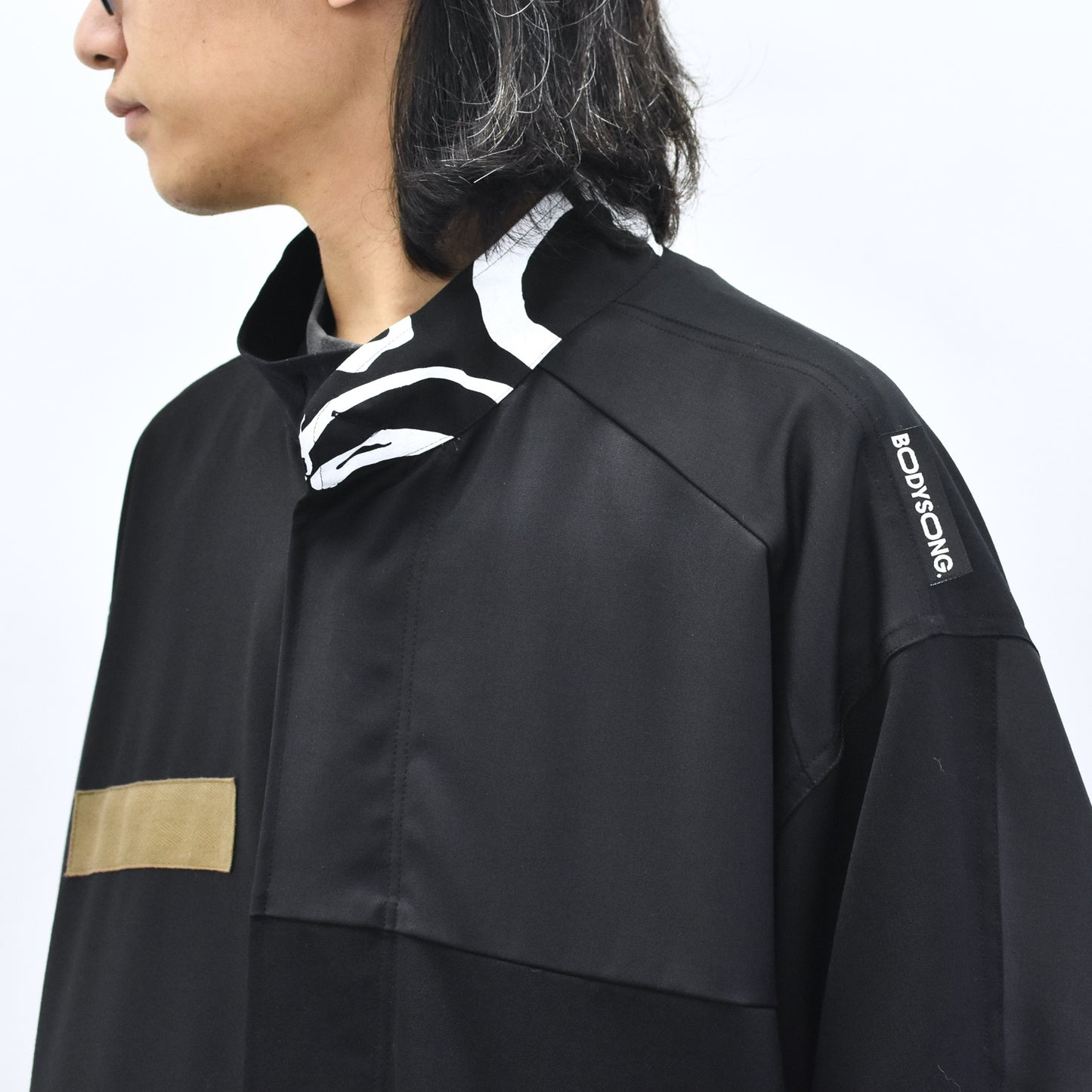 BODYSONG. / PATCHWORK MIL COAT MADE BY DISASSEMBLING AND RECONSTRUCTING A BUSINESS SUIT