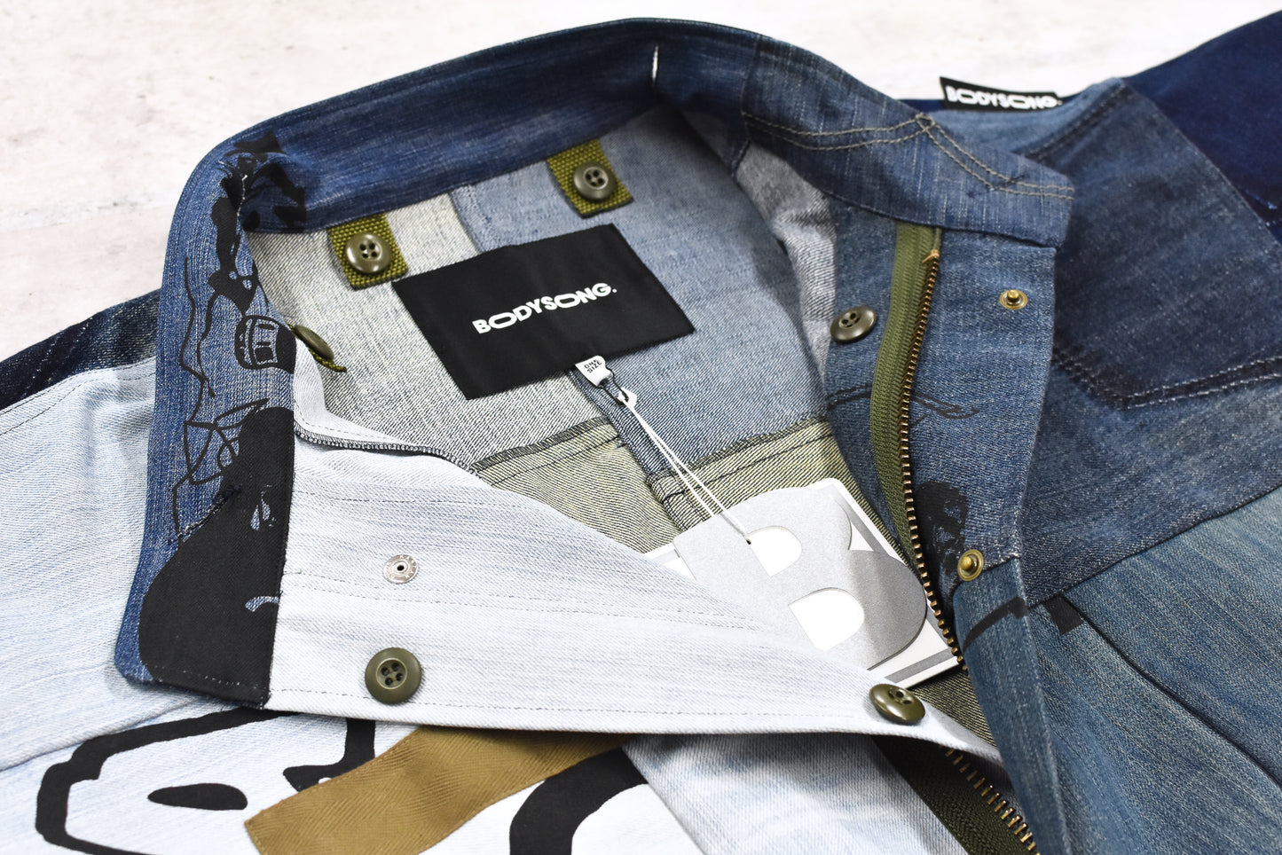 BODYSONG. / PATCHWORK MIL COAT MADE FROM RECONSTRUCTED VINTAGE DENIM