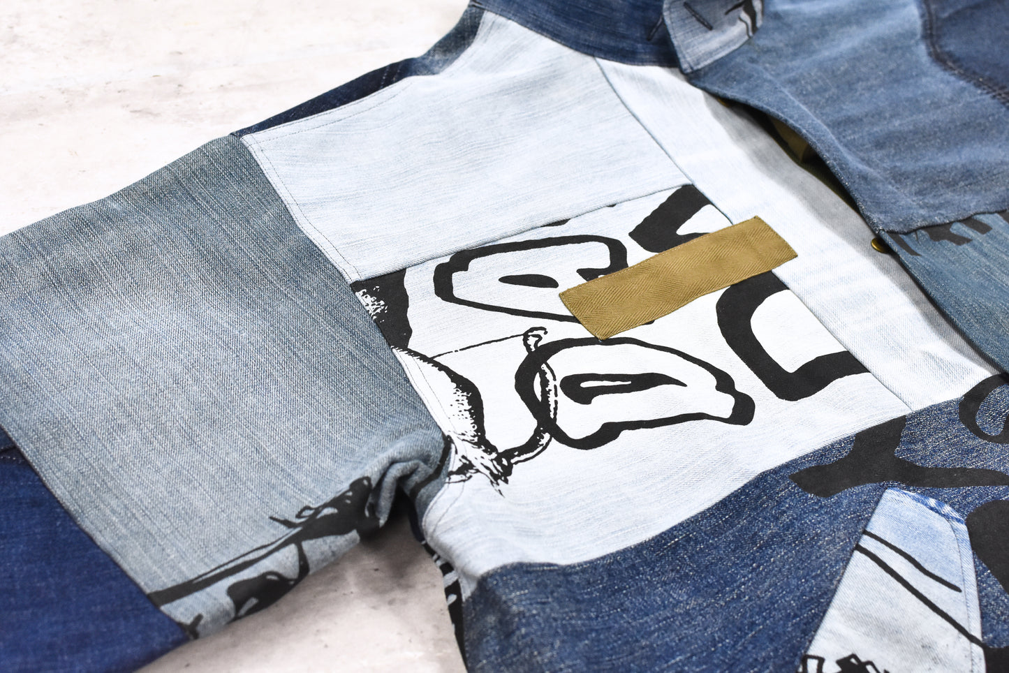 BODYSONG. / PATCHWORK MIL COAT MADE FROM RECONSTRUCTED VINTAGE DENIM