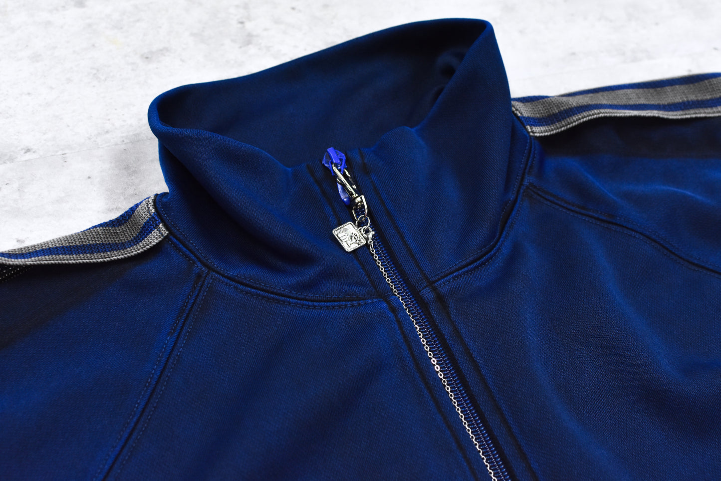 BODYSONG. / PIGMENT-DYED DISTRESSED TRACK JACKET - BLUE