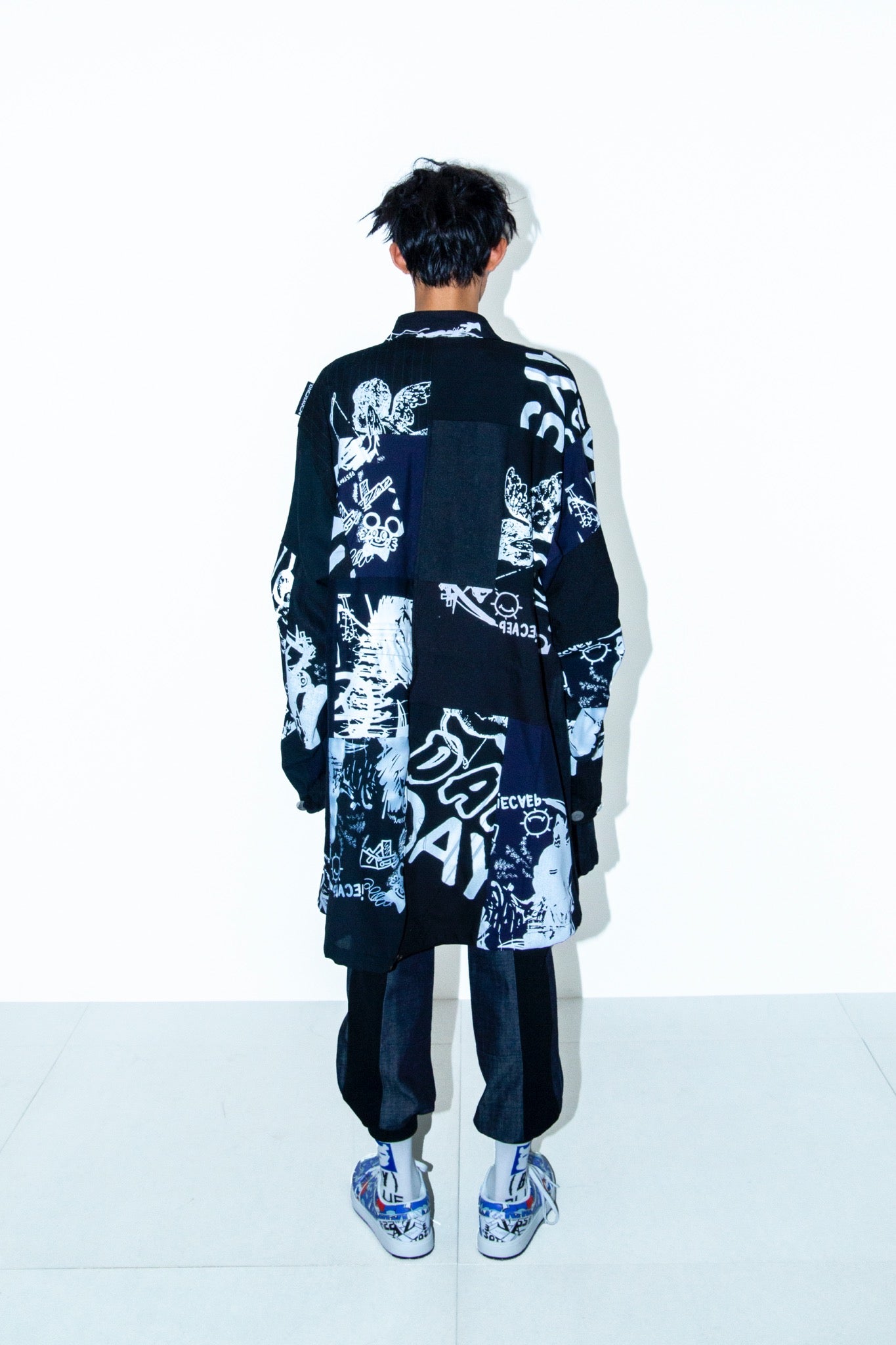 BODYSONG. / PATCHWORK MIL COAT MADE BY DISASSEMBLING AND RECONSTRUCTING A BUSINESS SUIT