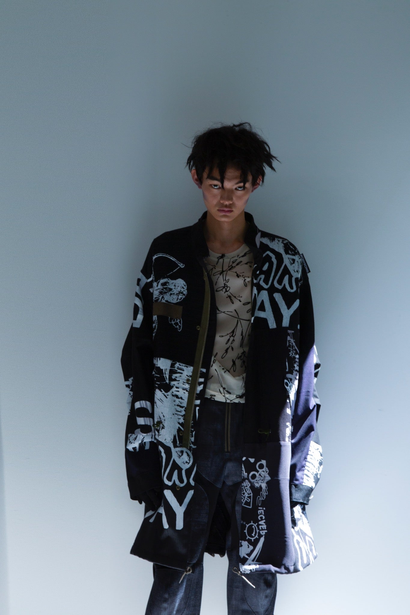 BODYSONG. / PATCHWORK MIL COAT MADE BY DISASSEMBLING AND RECONSTRUCTING A BUSINESS SUIT
