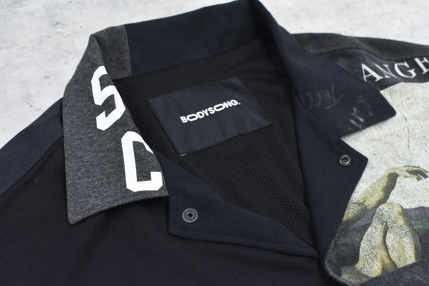 BODYSONG. / DECONSTRUCTED / RECONSTRUCTED VINTAGE T/COACH JACKET - BLACK