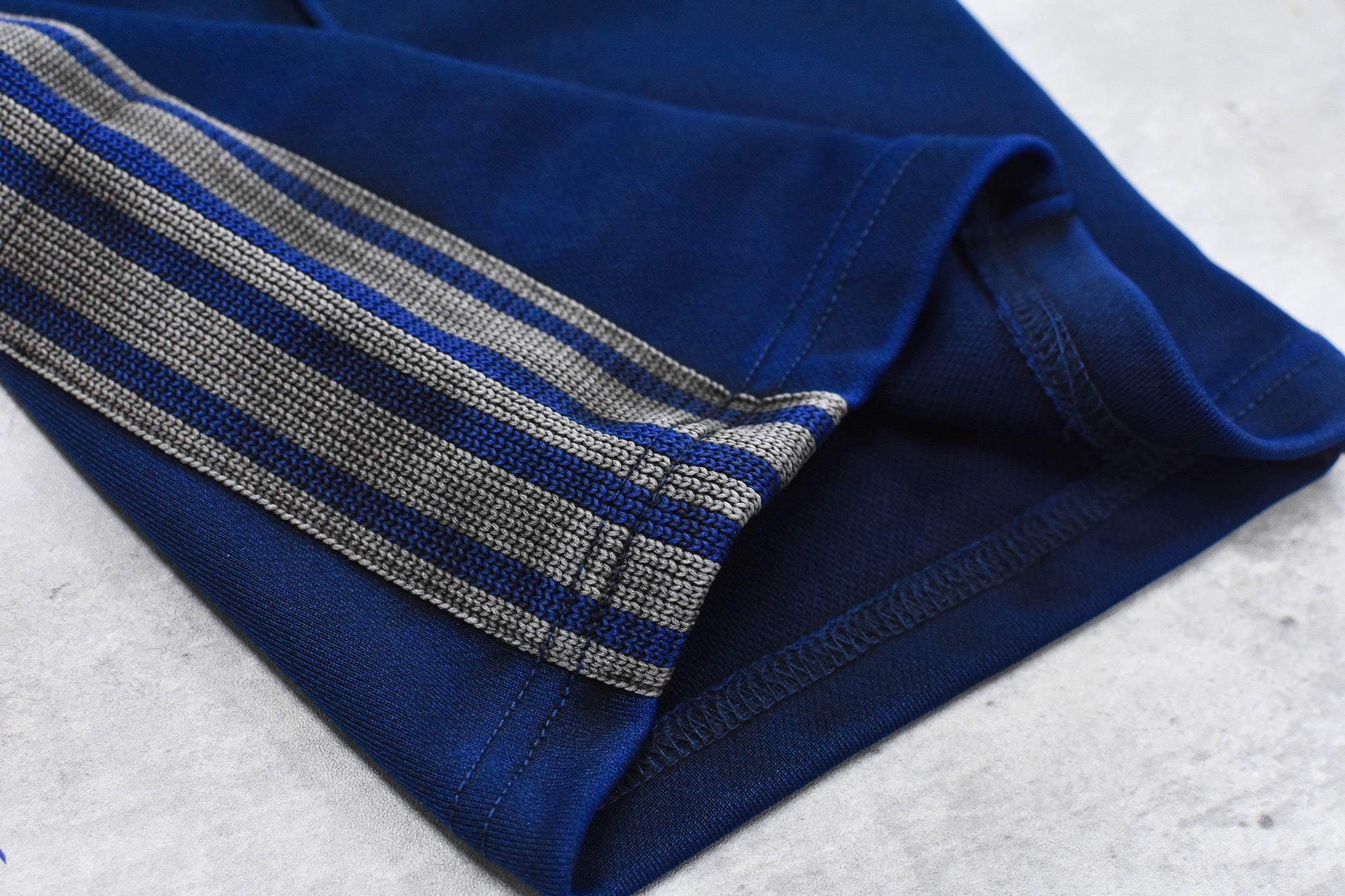 BODYSONG. / PIGMENT-DYED DISTRESSED TRACK TROUSERS - BLUE