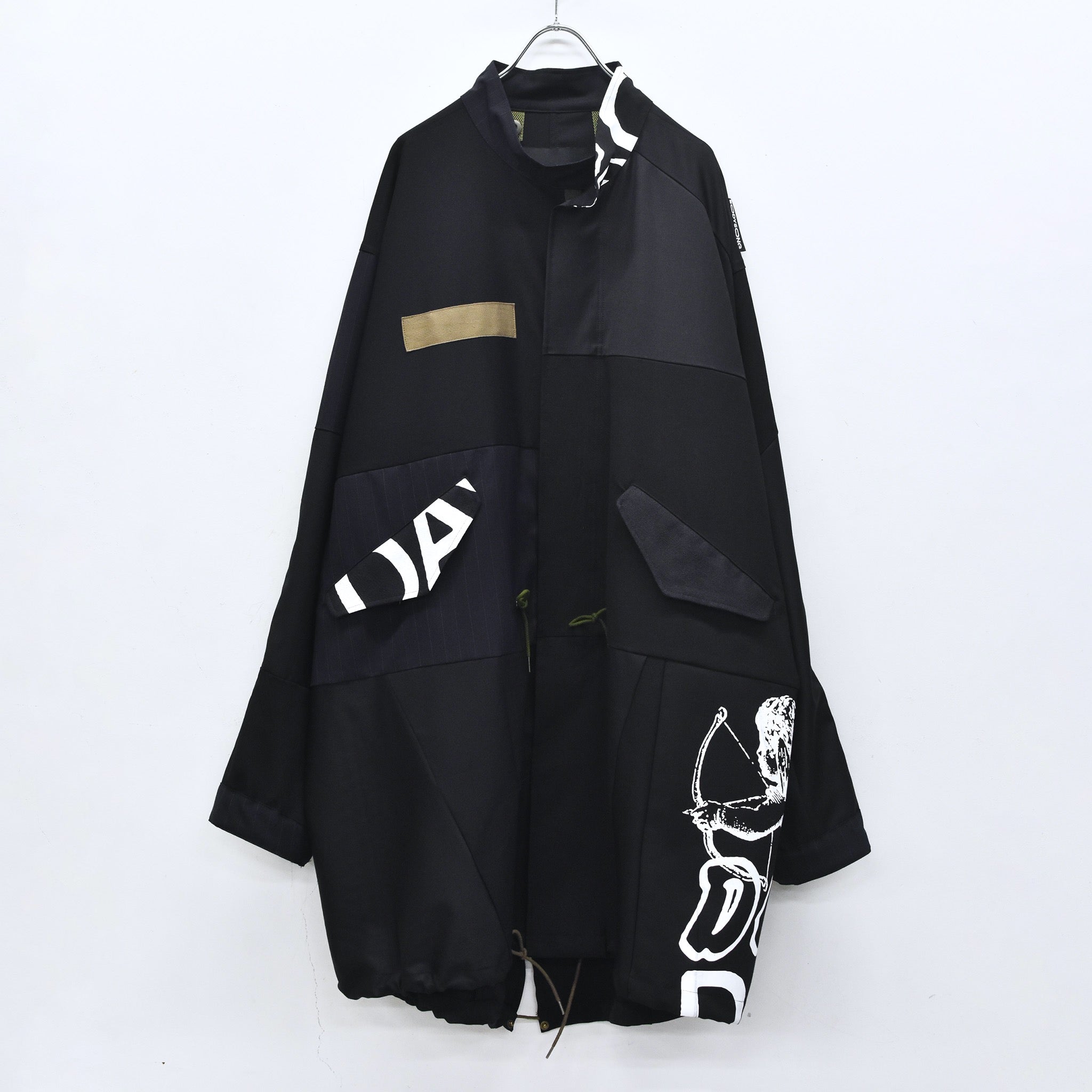 BODYSONG. / PATCHWORK MIL COAT MADE BY DISASSEMBLING AND RECONSTRUCTING A BUSINESS SUIT