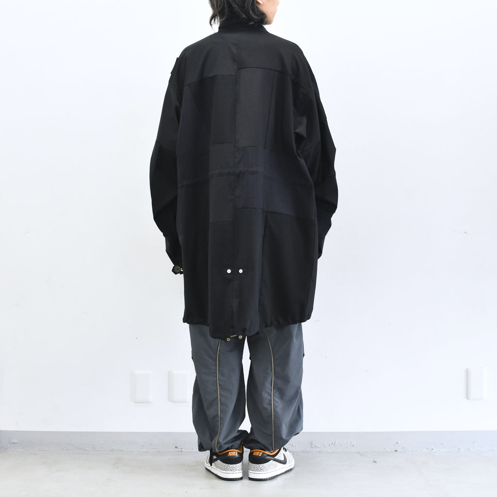 BODYSONG. / PATCHWORK MIL COAT MADE BY DISASSEMBLING AND RECONSTRUCTING A BUSINESS SUIT