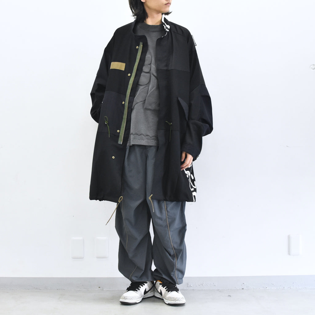 BODYSONG. / PATCHWORK MIL COAT MADE BY DISASSEMBLING AND RECONSTRUCTING A BUSINESS SUIT