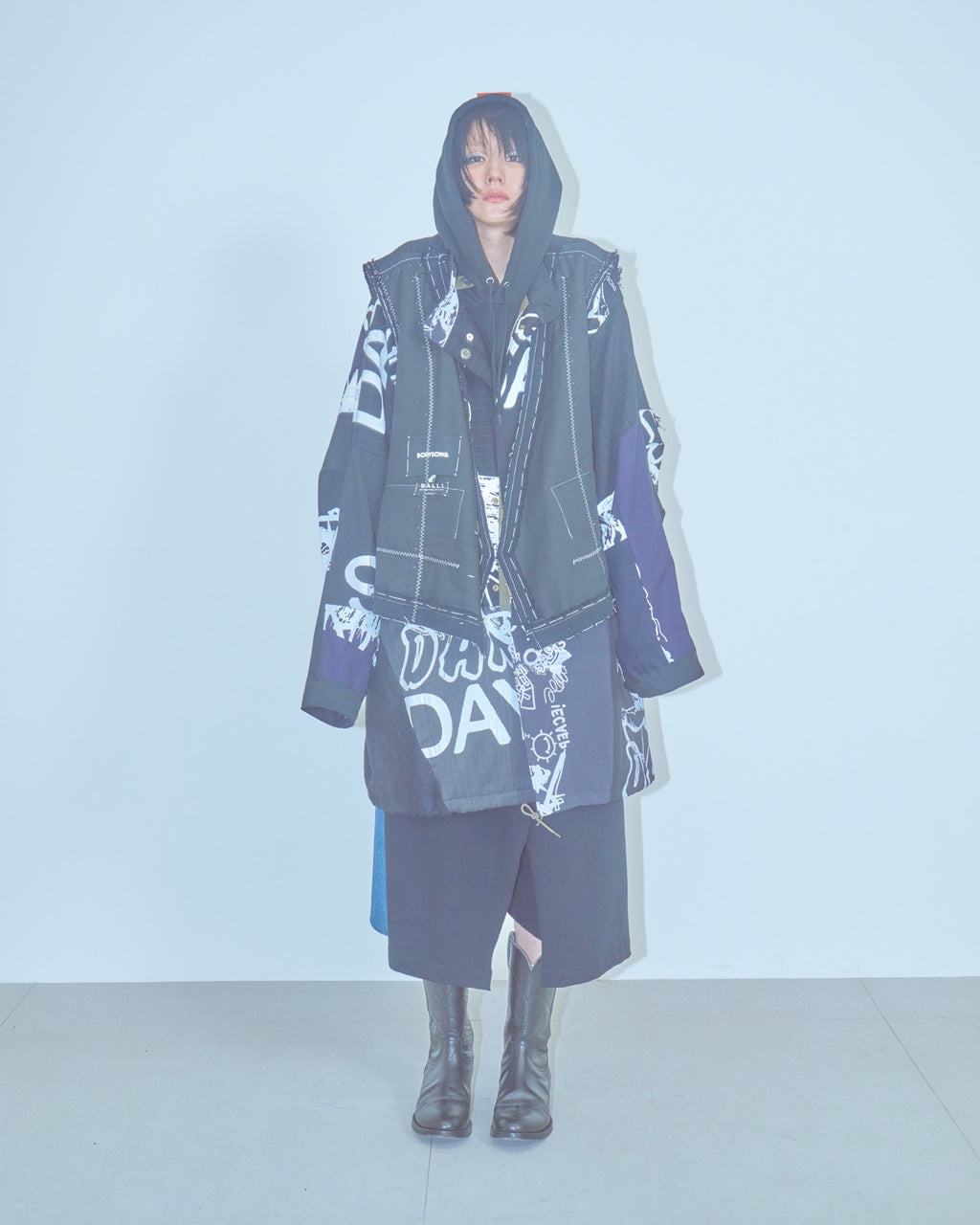 BODYSONG. / PATCHWORK MIL COAT MADE BY DISASSEMBLING AND RECONSTRUCTING A BUSINESS SUIT