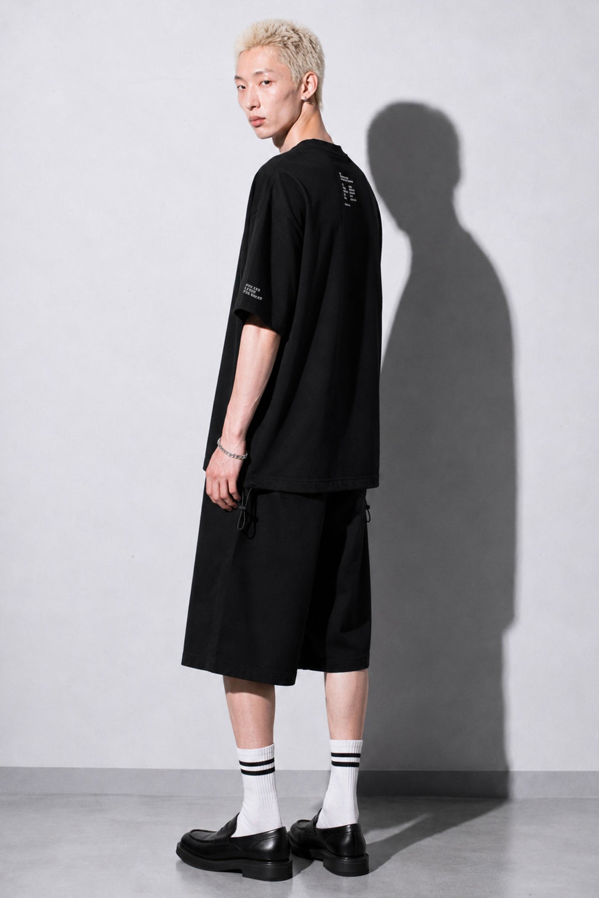 FUMEI / fake smile TEE - BLACK